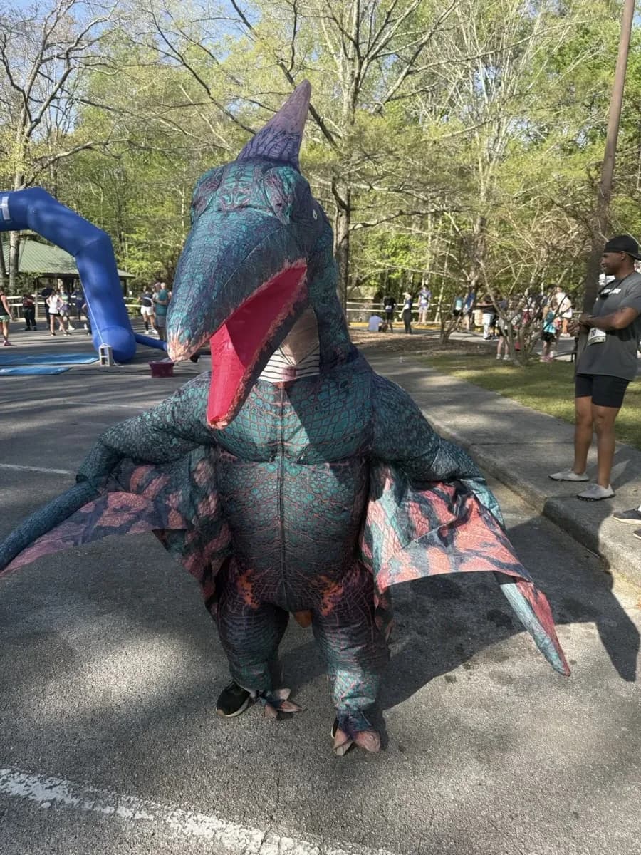 An unidentified figure photographed near the finish line area